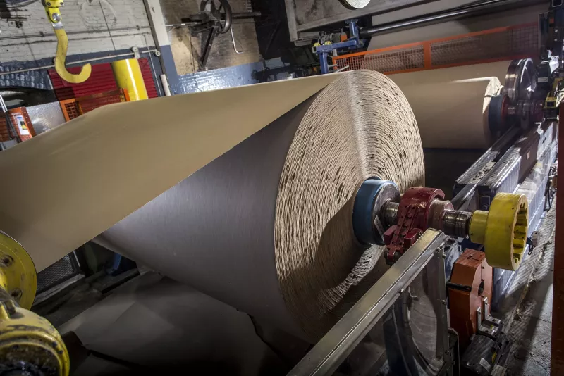 Paper roll in a manufacturing plant.