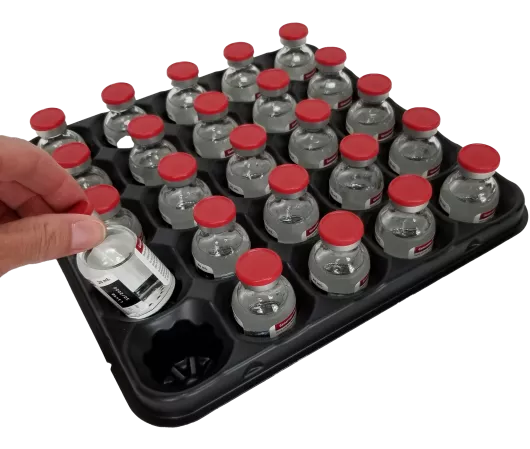 plastic trays formed around glass vials to protect them during transportation