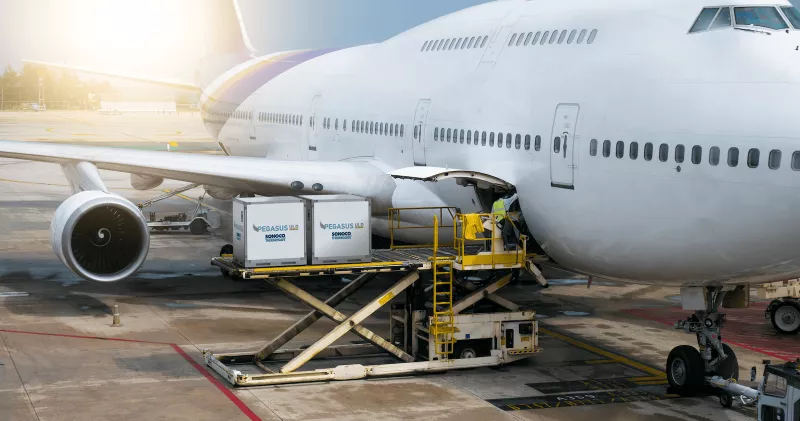 Temperature Assurance boxes being loaded into a plane's cargo hold